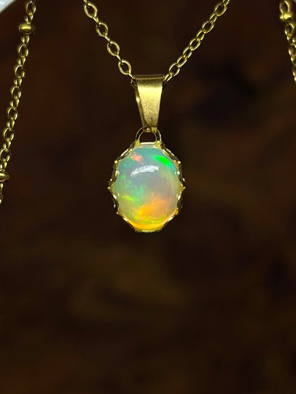 Magnolia ketting goud
