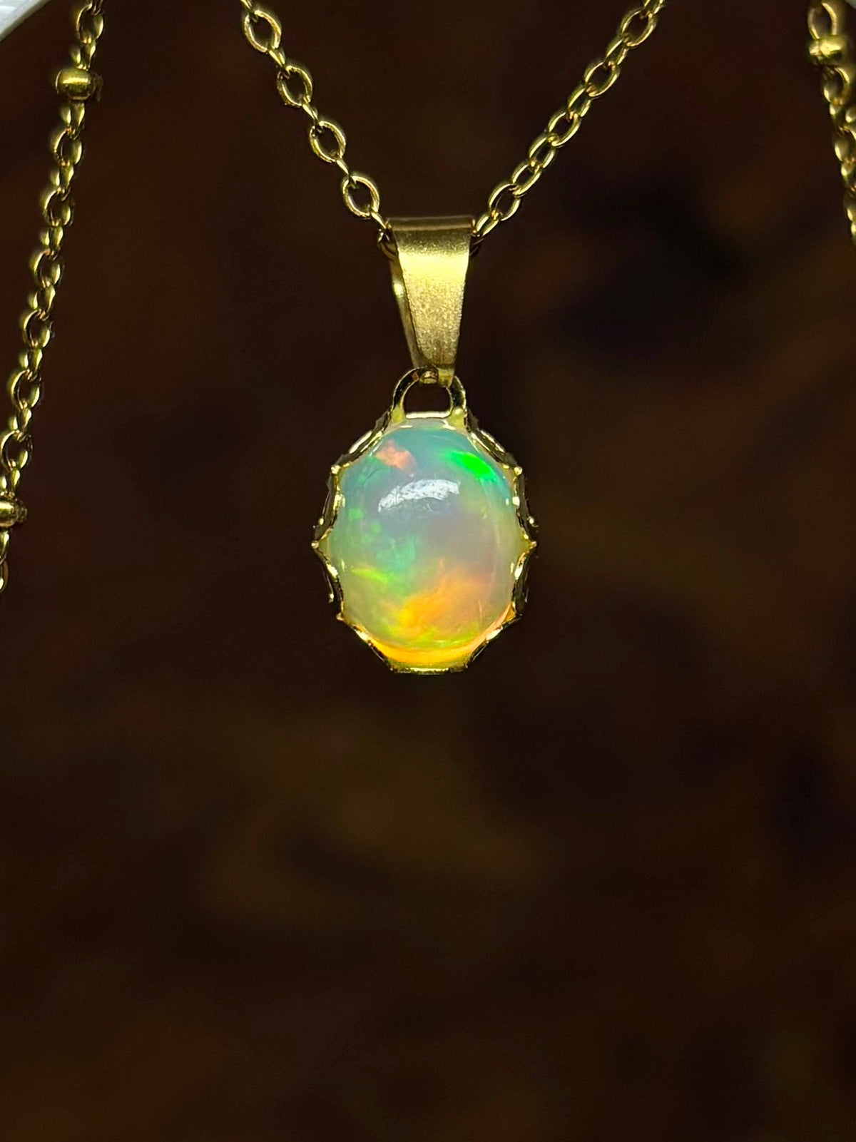 Magnolia ketting goud